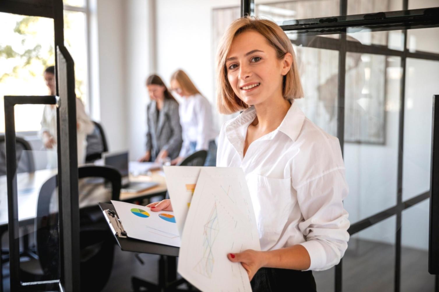 Technical support specialist helping with software setup on multiple devices