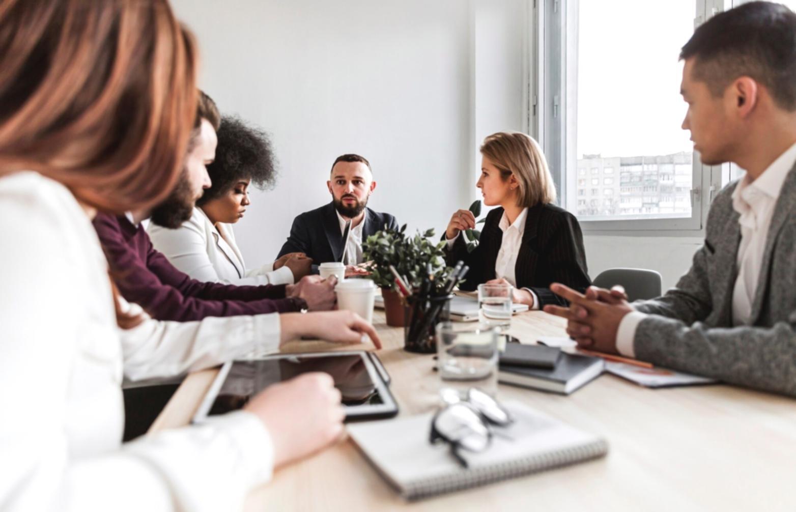 Modern financial education workspace with charts and planning materials